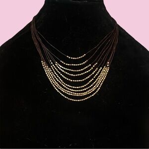 Nakamol multi strand layered gold bead cord necklace